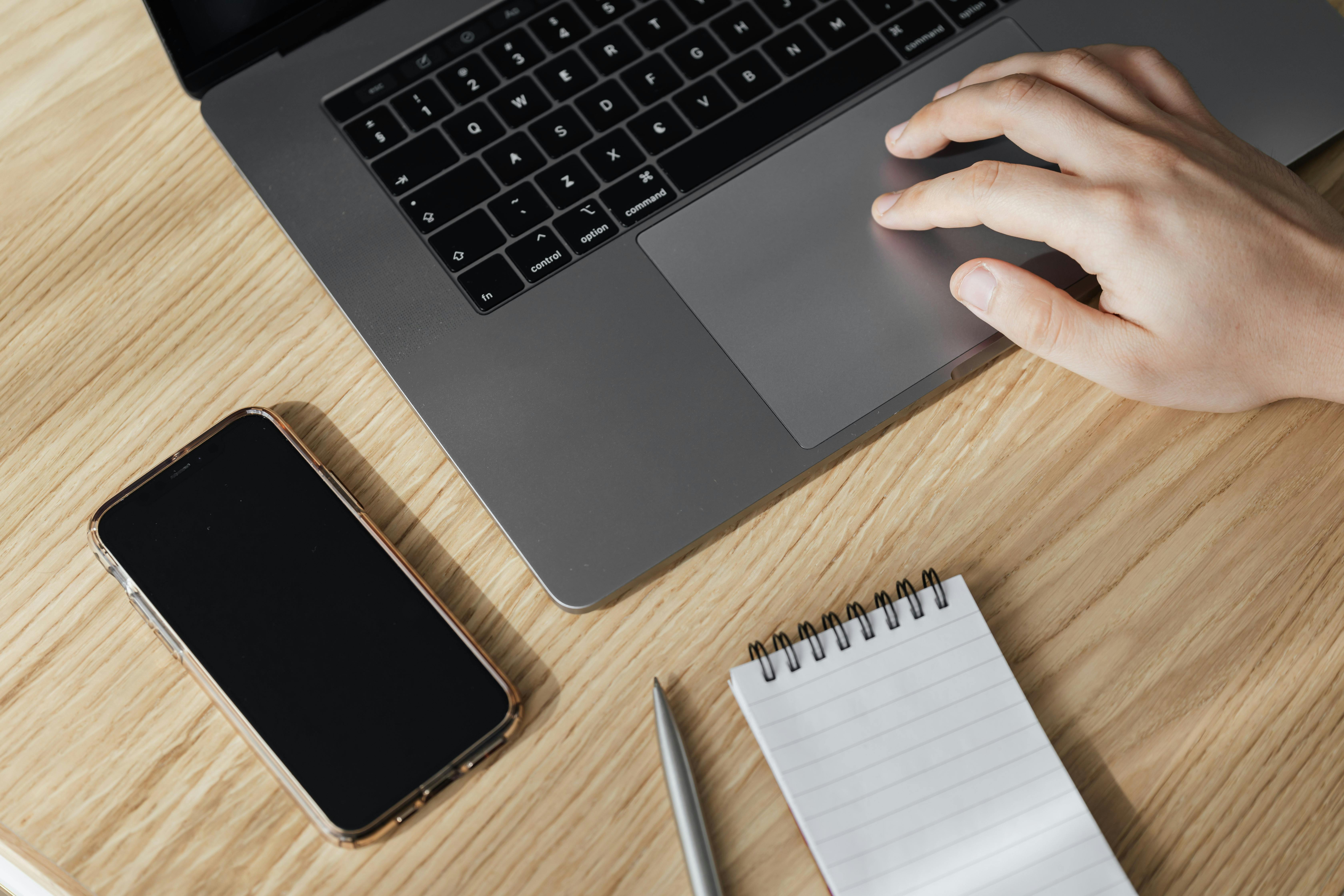 laptop and mobile phone on desk