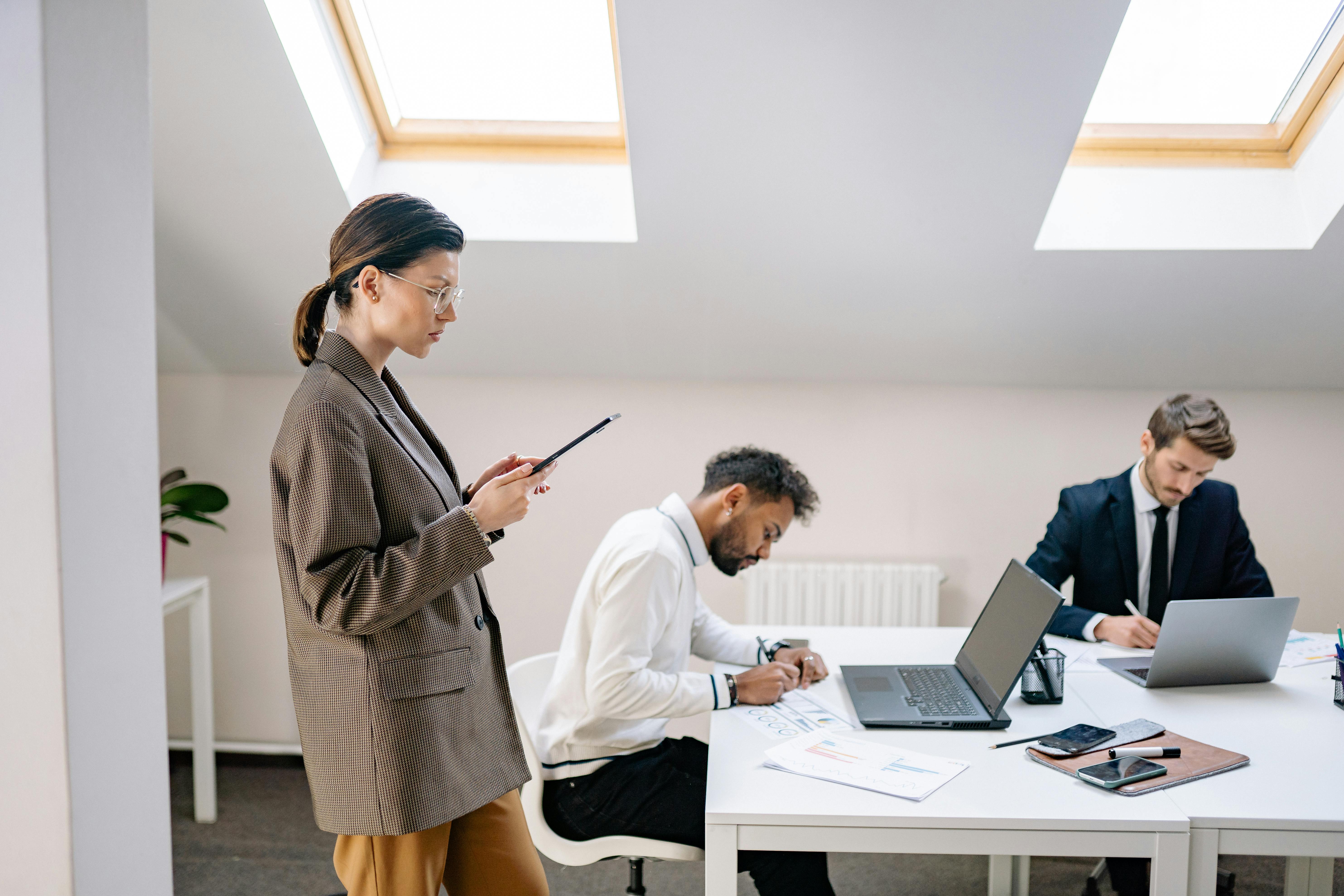 three people in an office setting